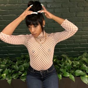 Soft pink lace blouse.